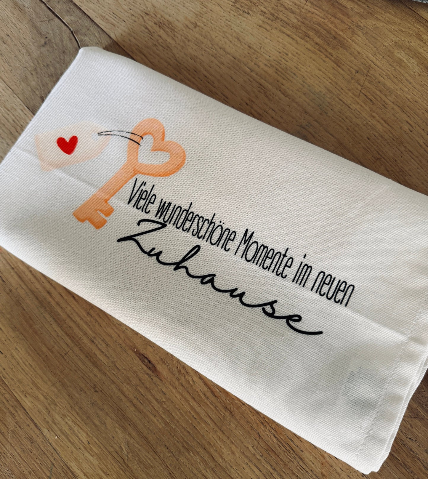 Geschirrtuch „Viele wunderschöne Momente im neuen Zuhause“ – stilvolles Einzugsgeschenk aus Baumwolle